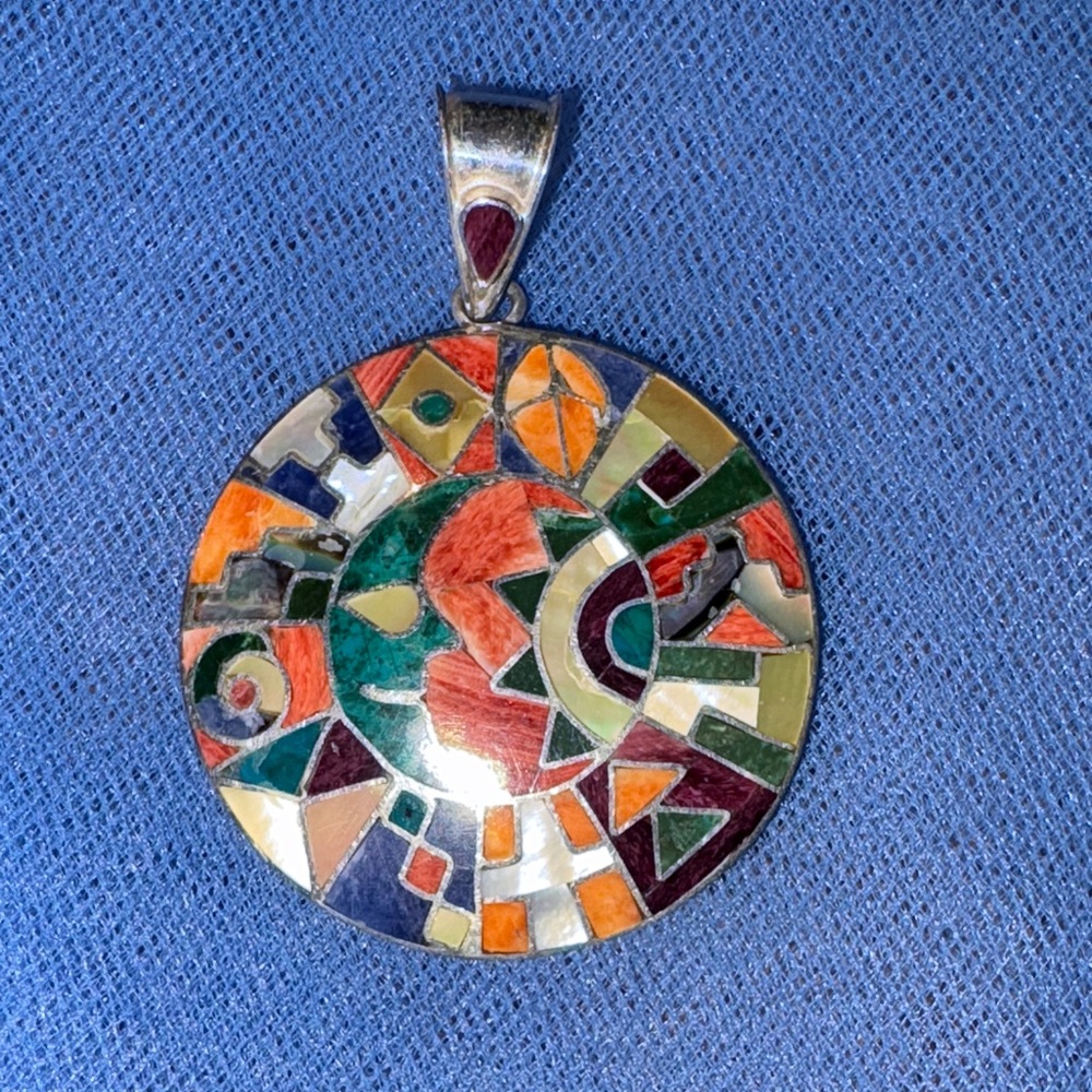 Inlaid Pendant with silver from Peru